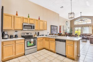 Fridge, microwave, oven, stovetop - Dog-friendly home with private outdoor pool, high-speed WiFi, and central AC (Davenport)