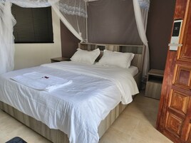 Deluxe Single Room, Garden View | Individually decorated, individually furnished, free WiFi, bed sheets