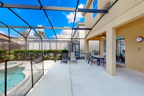 Outdoor dining - Gated-entry townhome with private pool, patio, game room, AC, & W/D (Davenport)