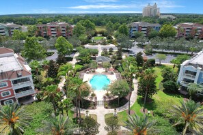 A heated pool - Ground floor condo at luxury resort with pools & hot tubs, close to Disney (Kissimmee)