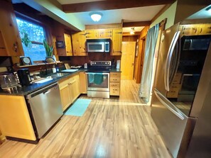 Microwave, oven, stovetop, dishwasher - Log Cabin Mountain Retreat,  2-bedroom cabin in Mills River North Carolina (Horse Shoe)