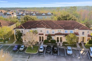 Exterior - 2-story snowbird-friendly townhouse near Disney with patio, streaming, W/D, AC (Kissimmee)