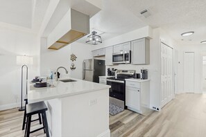 Fridge, microwave, oven, stovetop - Inviting resort condo with pool access, full kitchen & near Disney parks (Kissimmee)