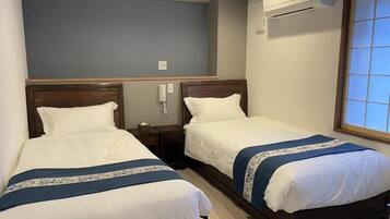 Habitación con 2 camas individuales | Wifi gratis