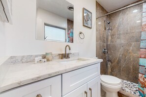 Shower, hair dryer, towels