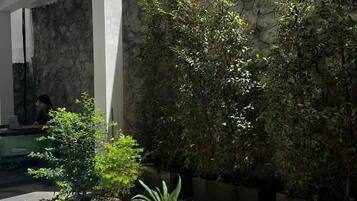 Deluxe Double or Twin Room, Balcony, Garden View | Property grounds