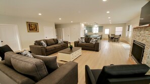 TV, fireplace - New Mountain Estate with Dual Living Spaces | 32 Guests | Perfect for Reunions (Garden City)