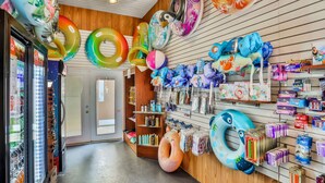 A store with various inflatable rings and swimming accessories on display. - Sunny Oasis | Townhouse in Davenport with resort amenities, near Disney (Davenport)