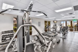 Fitness facility - Two-story, dog-friendly gem near theme parks with pool, central AC & on-site gym (Kissimmee)