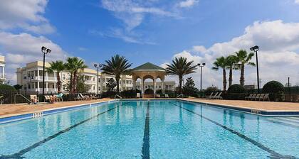 Top-floor 2BR condo with golf course views, garage & Reunion Resort amenities