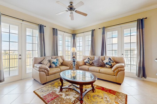 Top-floor 2BR condo with golf course views, garage & Reunion Resort amenities