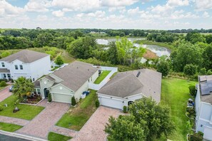 Exterior - Dog-friendly ground-floor home in gated community w/lake views & enclosed patio (Davenport)