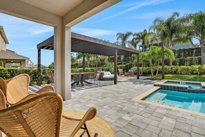 A heated pool - Dog-friendly getaway with private pool + spa, putting green, patio, & game room (Kissimmee)