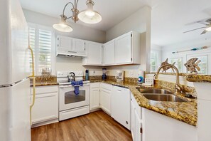 Fridge, microwave, oven, stovetop - Lakeside Getaway Near Orlando Attractions | Pools, Hot Tub & Resort Amenities (Kissimmee)