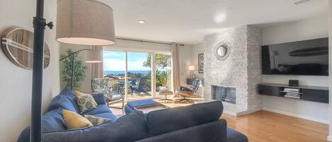 Smart TV, fireplace, books, offices