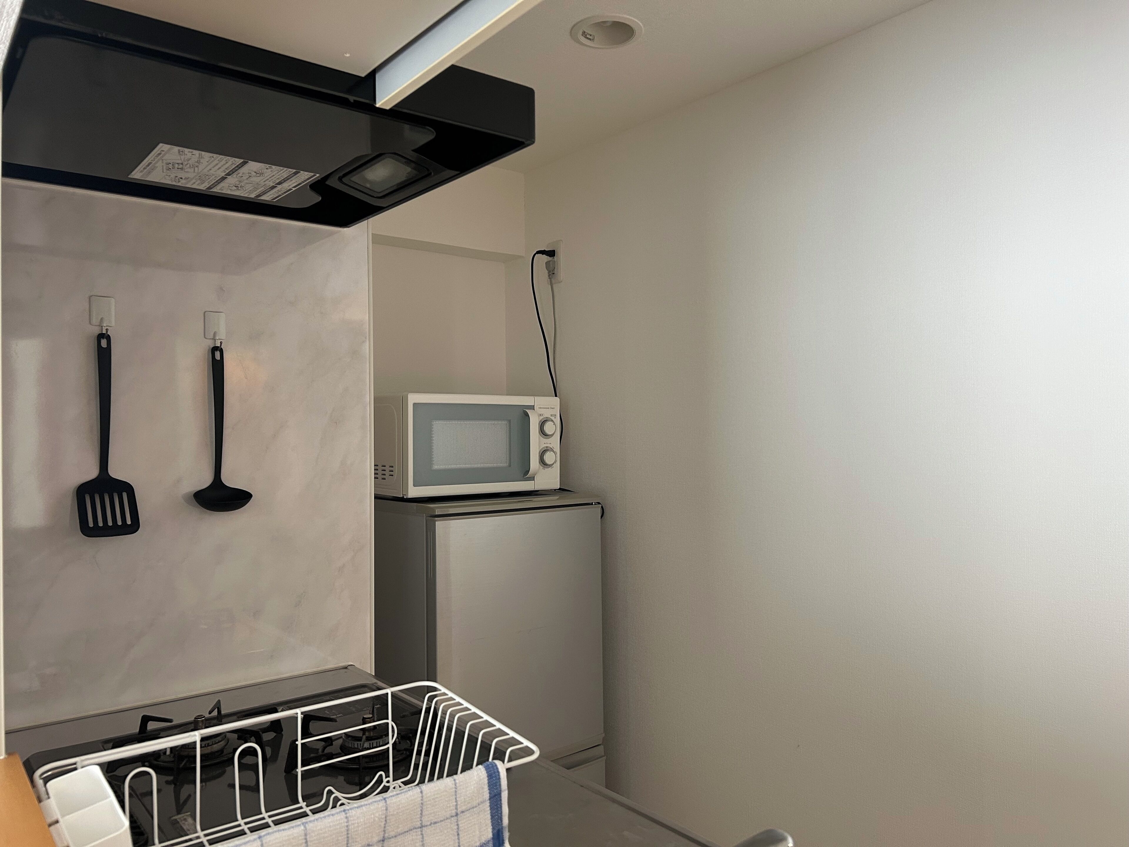 Apartment | Private kitchen | Fridge, microwave, stovetop, cookware/dishes/utensils