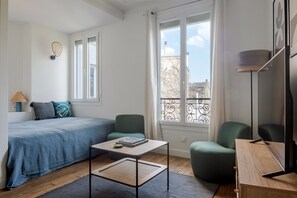 1 slaapkamer, een strijkplank/strijkijzer, wifi, beddengoed