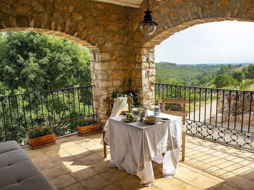 Isolated farmhouse surrounded, vineyards, olive trees and forest
