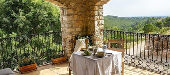Isolated farmhouse surrounded, vineyards, olive trees and forest