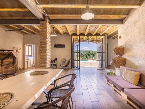 Isolated farmhouse surrounded, vineyards, olive trees and forest