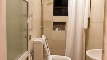 Deluxe Single Room | Bathroom | Shower, slippers, towels, soap