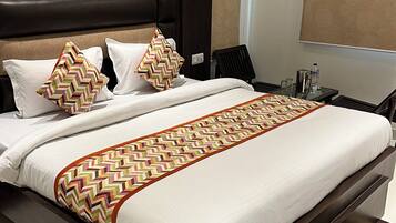 Luxury Suite | Living area | 36-inch LCD TV with cable channels, streaming services, printers