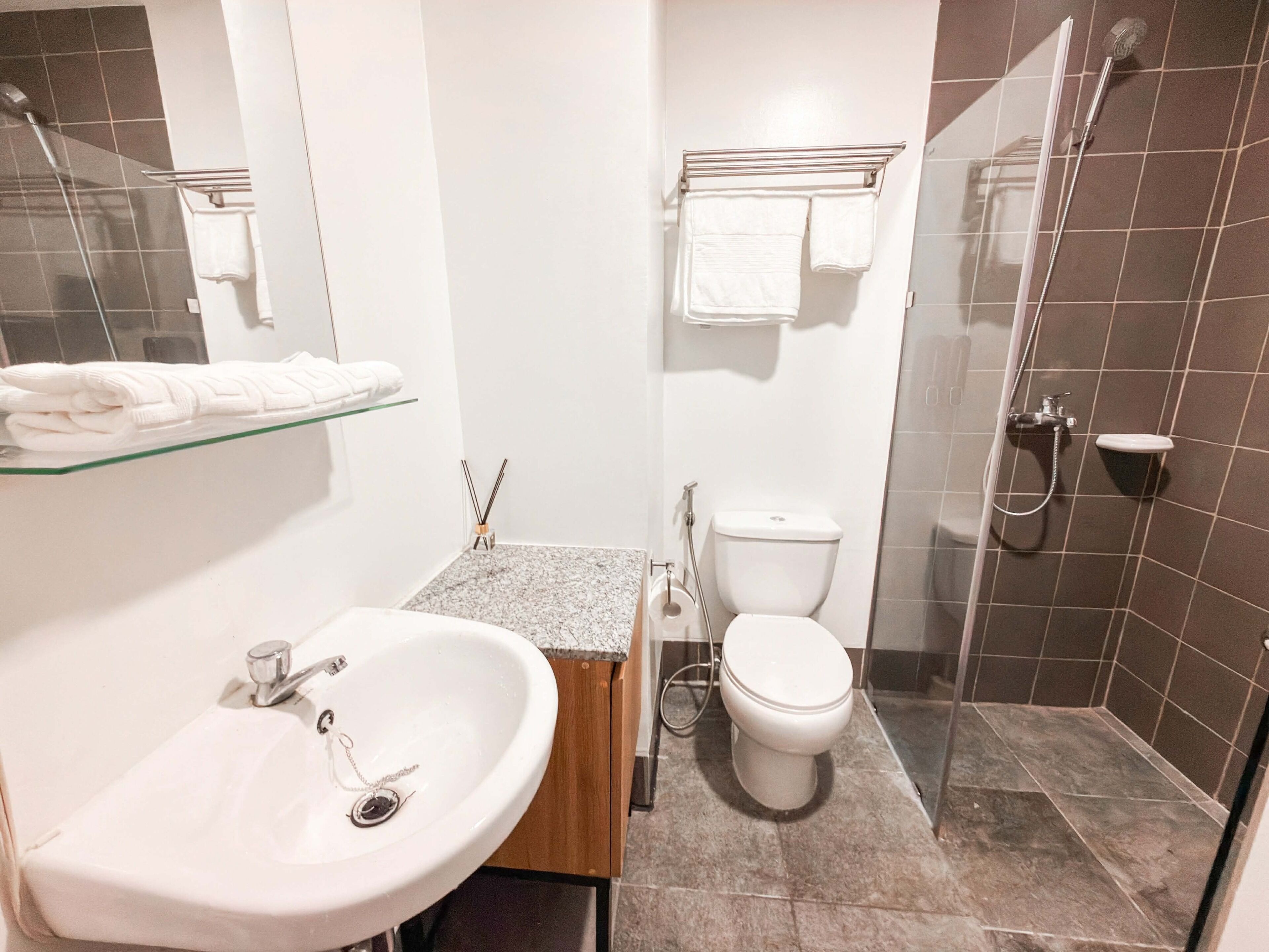 Shower, bidet, towels, soap