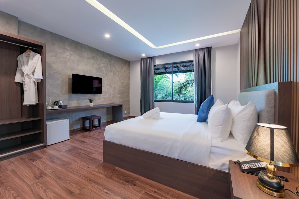 Family Triple Room, Pool View | In-room safe, individually decorated, individually furnished, desk