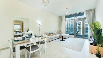 Exclusive Apartment, 1 Bedroom, Air conditioning, City View | Living area | 35-inch Smart TV with digital channels
