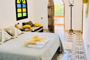 Deluxe Suite, 1 King Bed, Private Bathroom | Bathroom | Shower, free toiletries, hair dryer, towels