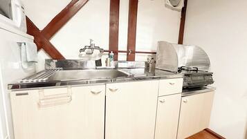 Fridge, microwave, stovetop, cookware/dishes/utensils