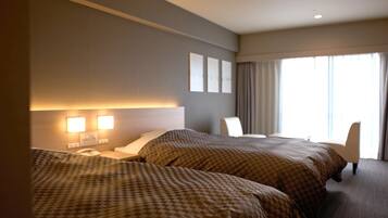 Twin Room, 2 Double Beds | In-room safe, desk, laptop workspace, free WiFi