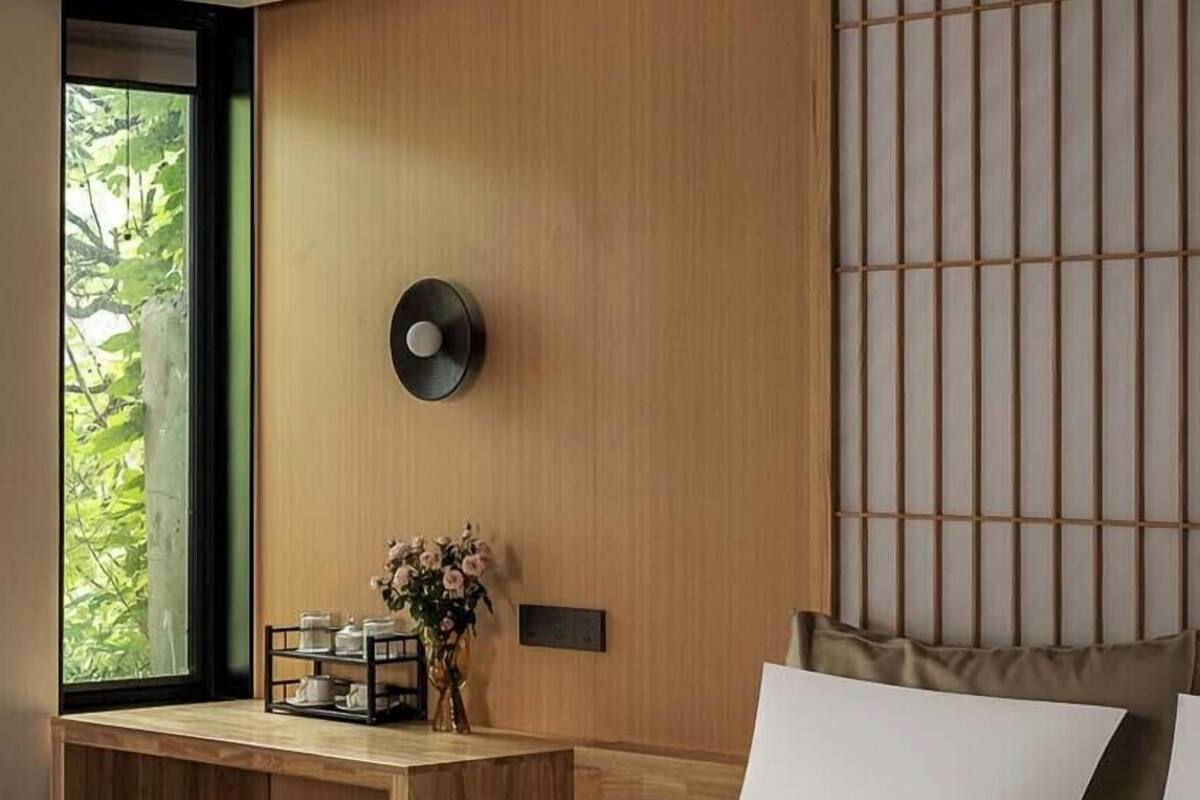 Habitación Signature doble | Cortinas opacas, sistema de insonorización, wifi gratis y ropa de cama