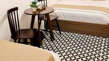 Tripla Deluxe | Materassi a doppio strato, una scrivania, Wi-Fi gratuito, lenzuola