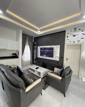 Family Room, Balcony, City View | Interior - Jives Luxury Suites (Abuja)