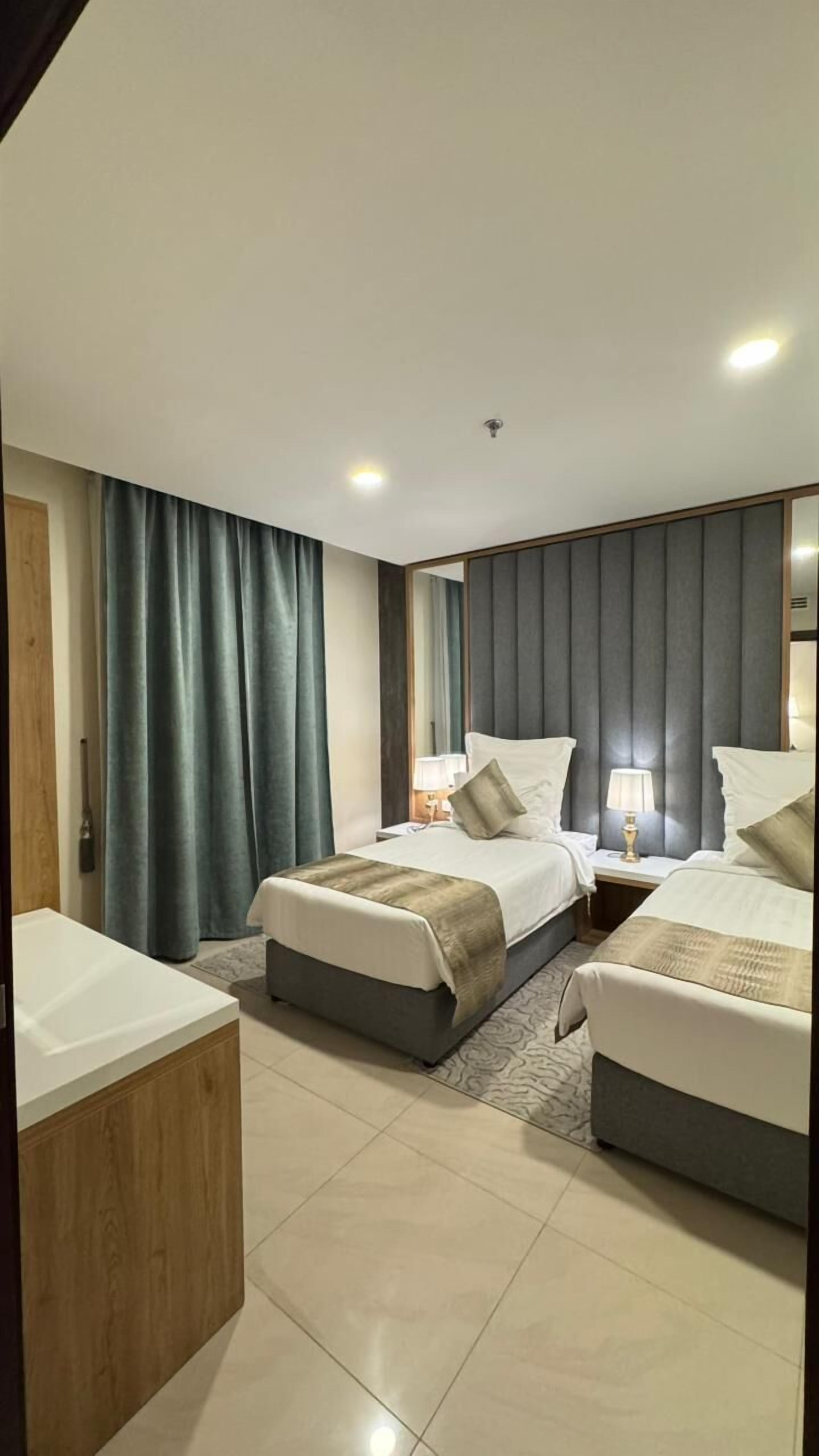 Executive Suite, 2 Bedrooms | In-room safe, desk, laptop workspace, iron/ironing board