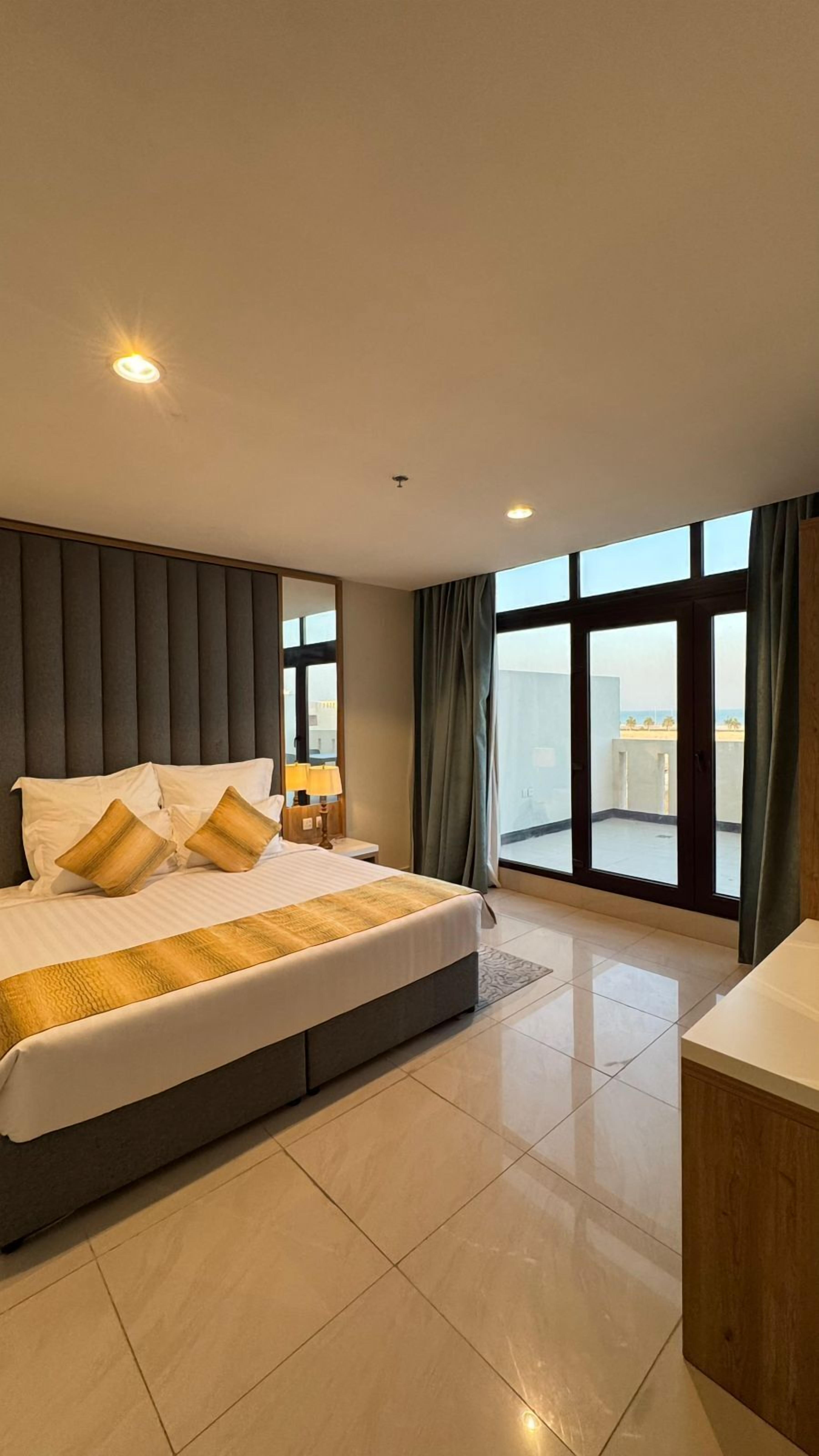 Superior Suite, 2 Bedrooms, Sea View | In-room safe, desk, laptop workspace, iron/ironing board
