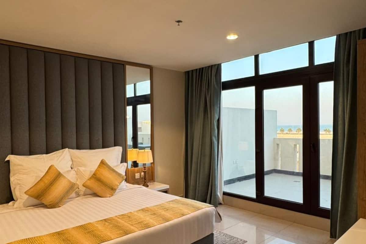 Superior Suite, 2 Bedrooms, Sea View | In-room safe, desk, laptop workspace, iron/ironing board