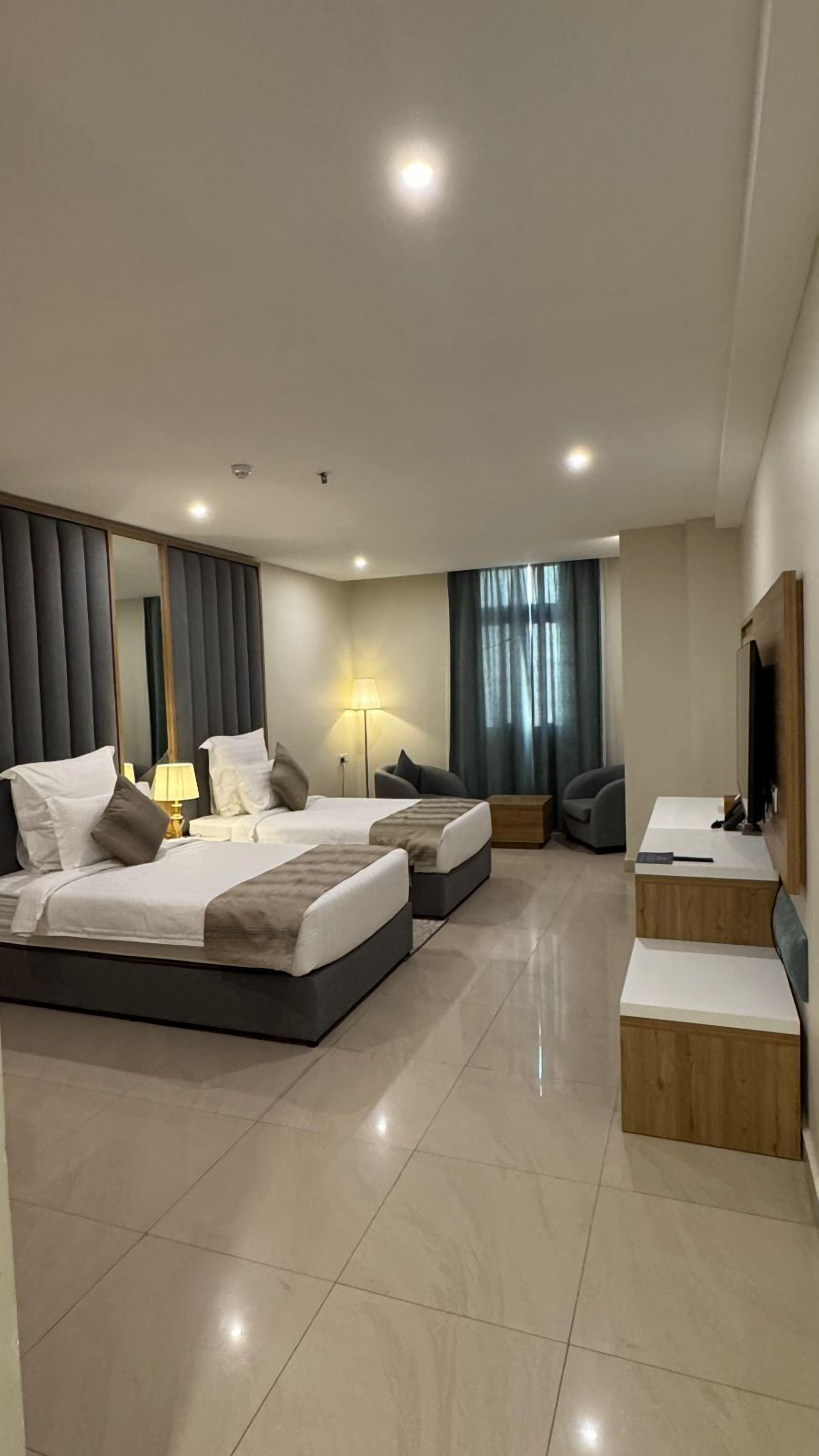 Deluxe Double or Twin Room | In-room safe, desk, laptop workspace, iron/ironing board