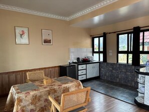 Premium Studio Suite, Balcony | Dining - Boudha Mandala Hotel (Gokarneshwar)