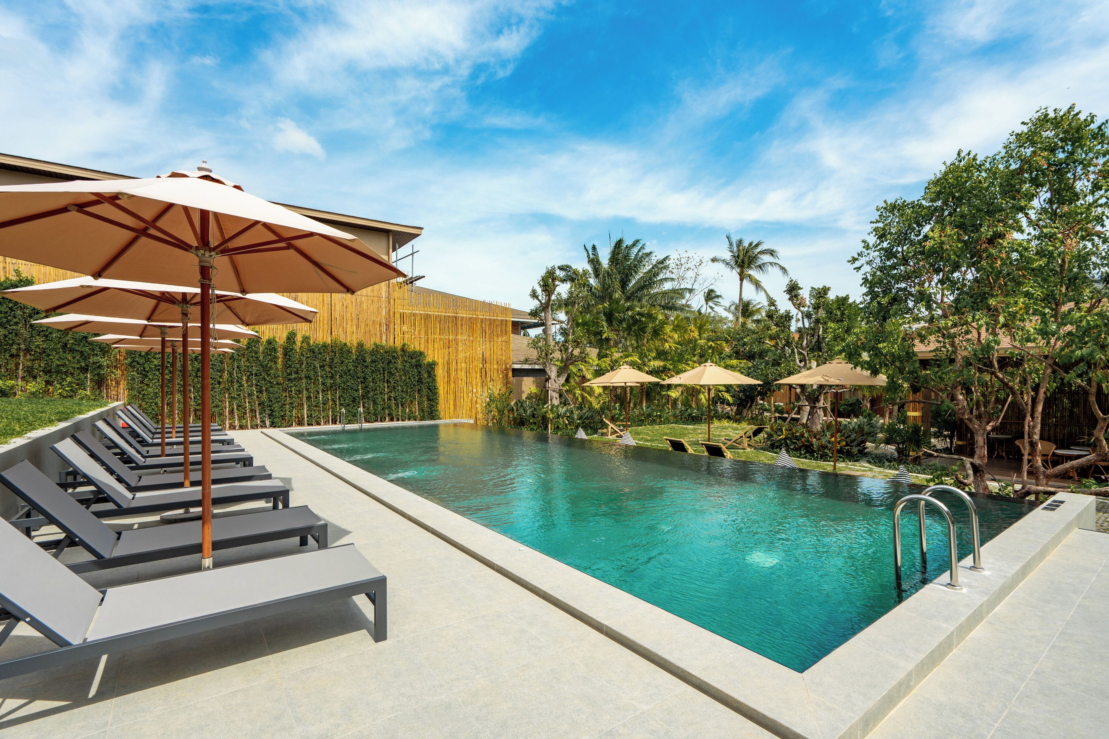 Outdoor pool, pool umbrellas, sun loungers