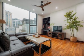 Signature Studio, 2 Queen Beds, Non Smoking, City View | Living area - Sakamoto 1 Apartments by XÔI Residences (Giang Vo)