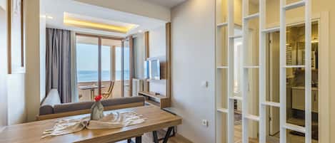 Junior Suite, Balcony, Sea View | Living area | 32-inch LCD TV with satellite channels, Netflix, streaming services