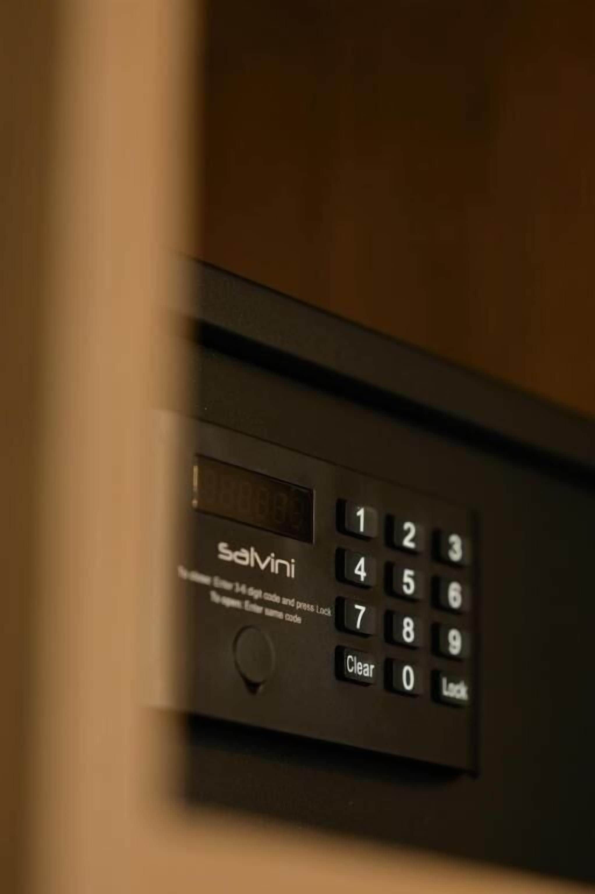 A keypad with the brand name 'Salvi' and a numeric keypad with a 'Clear' button.