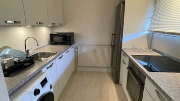 Apartment, Multiple Bedrooms, Balcony | Laundry