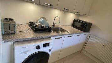 Apartment, Multiple Bedrooms, Balcony | Laundry