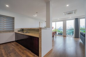 45-inch Smart TV with digital channels, Netflix, streaming services - Aqua Apartments by XÔI Residences (Tay Ho)