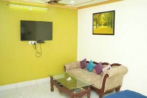 Habitación doble superior | Zona de estar