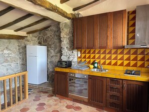 Een magnetron, een oven, een kookplaat