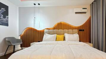 Junior Room, Balcony, City View | Desk, laptop workspace, blackout drapes, soundproofing